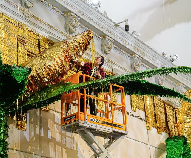 Large-scale installation of corncob piñatas.