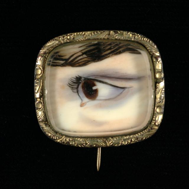 A painting of an eye seen in the reflection of a mirror