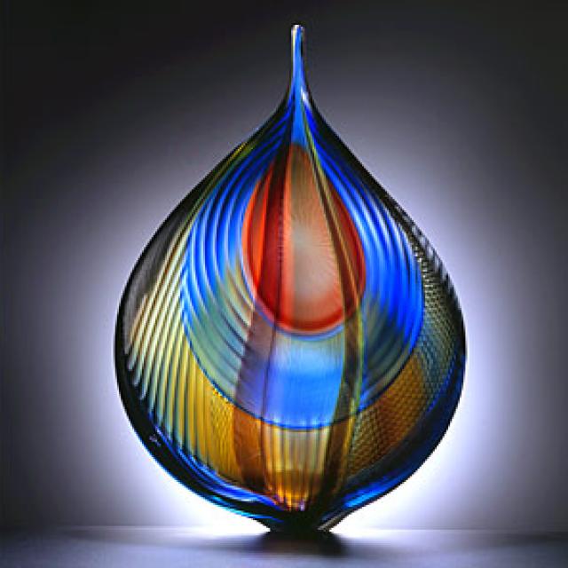 This is a blown glass structure with multiple incalmi crisscrossed canes. 