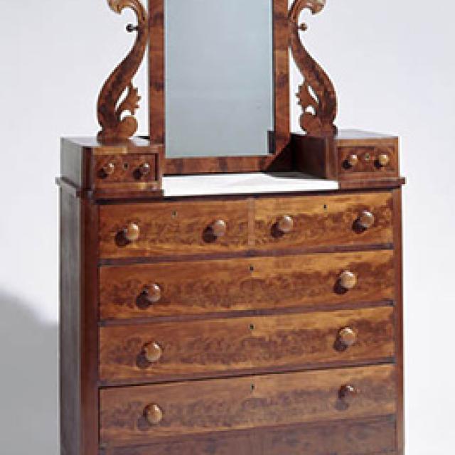 A bureau made of mahogany, yellow pine, and poplar
