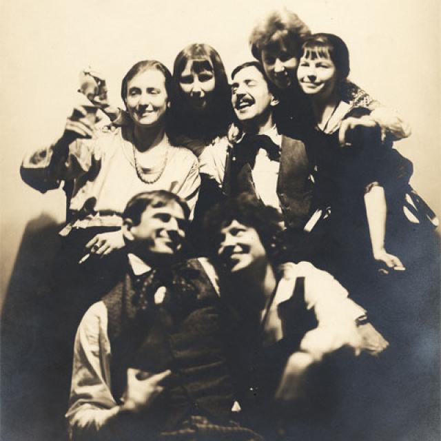 A picture of a group of people smiling and laughing.