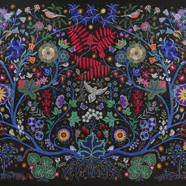 An artwork made of small beads depicting plants and flowers.