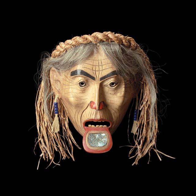 A mask of a figure with a labret.
