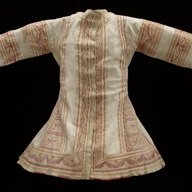 A white coat with red details.