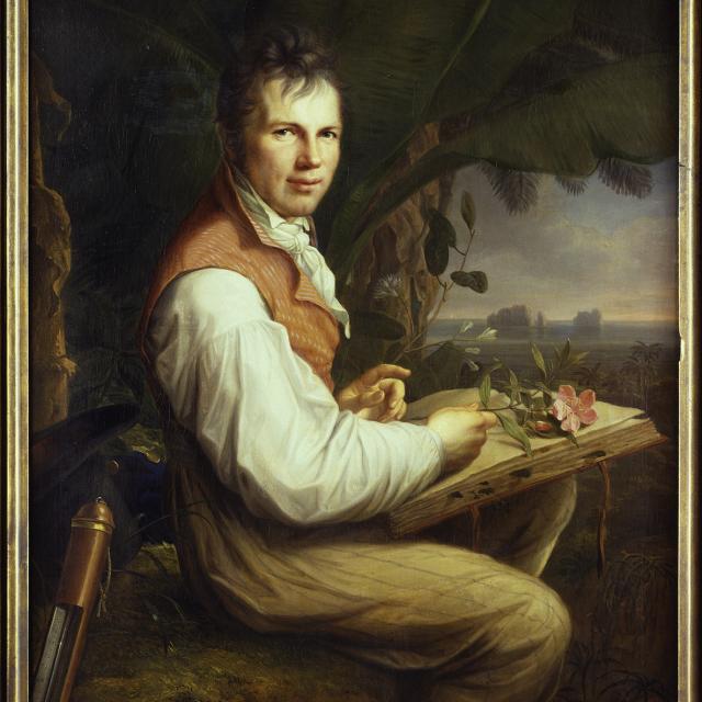 A portrait of a man sitting. 