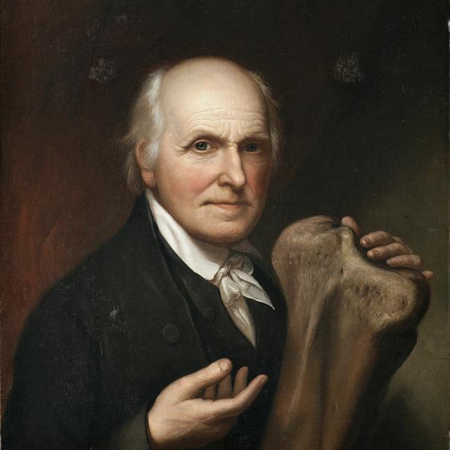 A portrait of a man sitting. 