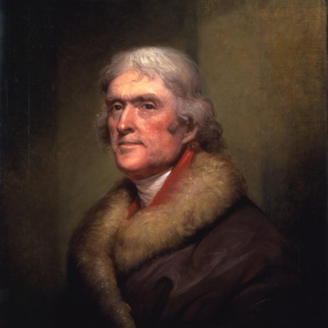 A portrait of a man sitting. 