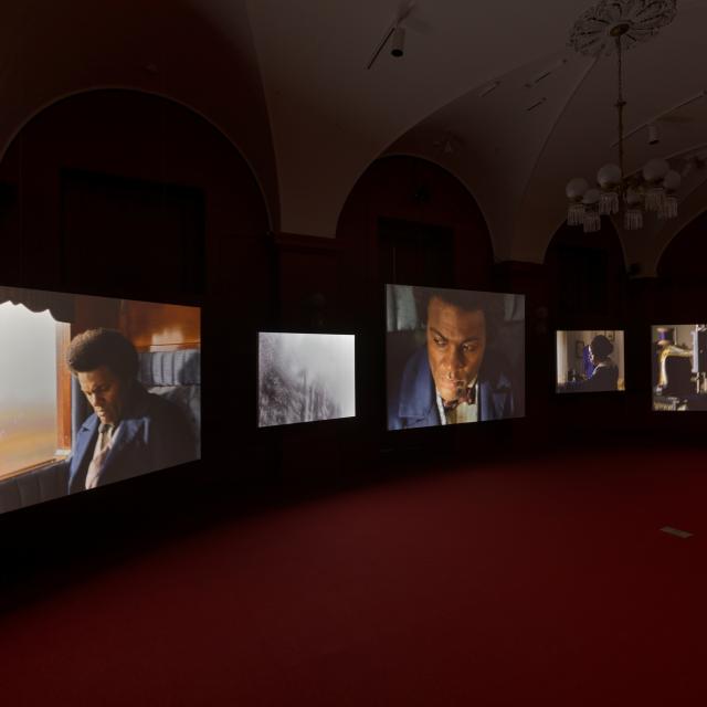 Five screen installation showing period reenactments of nineteenth-century activist Frederick Douglass.