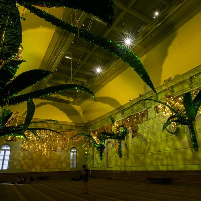 Large-scale installation of corncob piñatas.